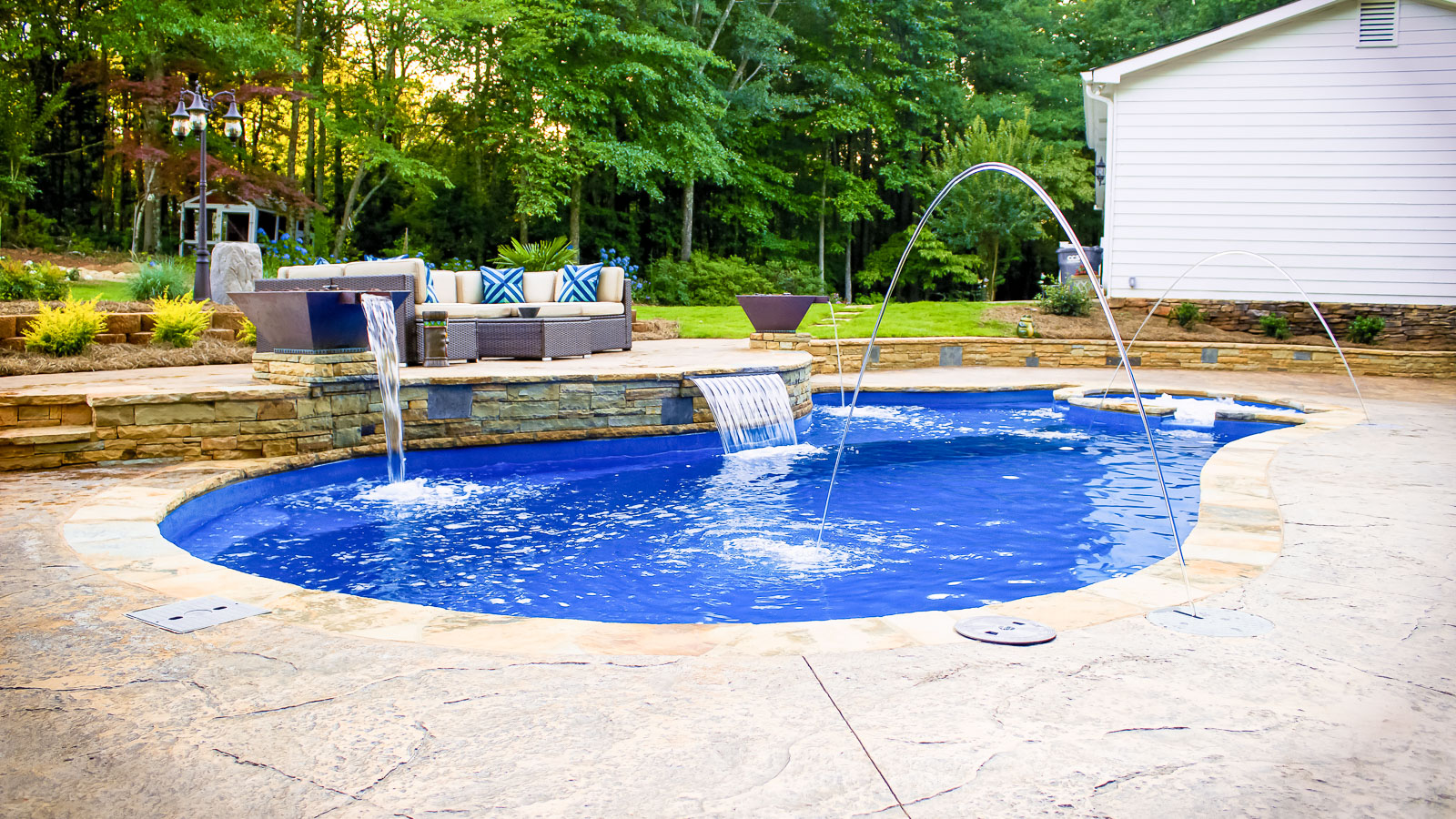 The Brilliant freeform fiberglass swimming pool with spa Imagine Pools