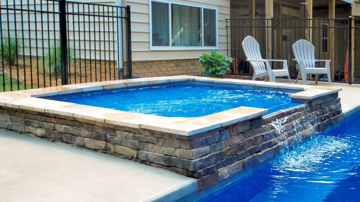 rectangle fiberglass pool with tanning ledge