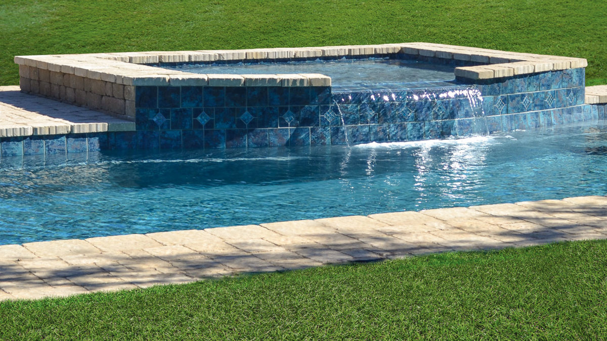 The Pearl curved fiberglass tanning ledge Imagine Pools