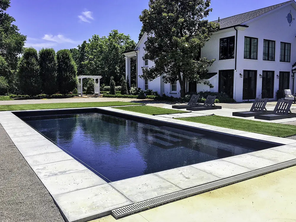 Discover the advantages of a black fiberglass pool