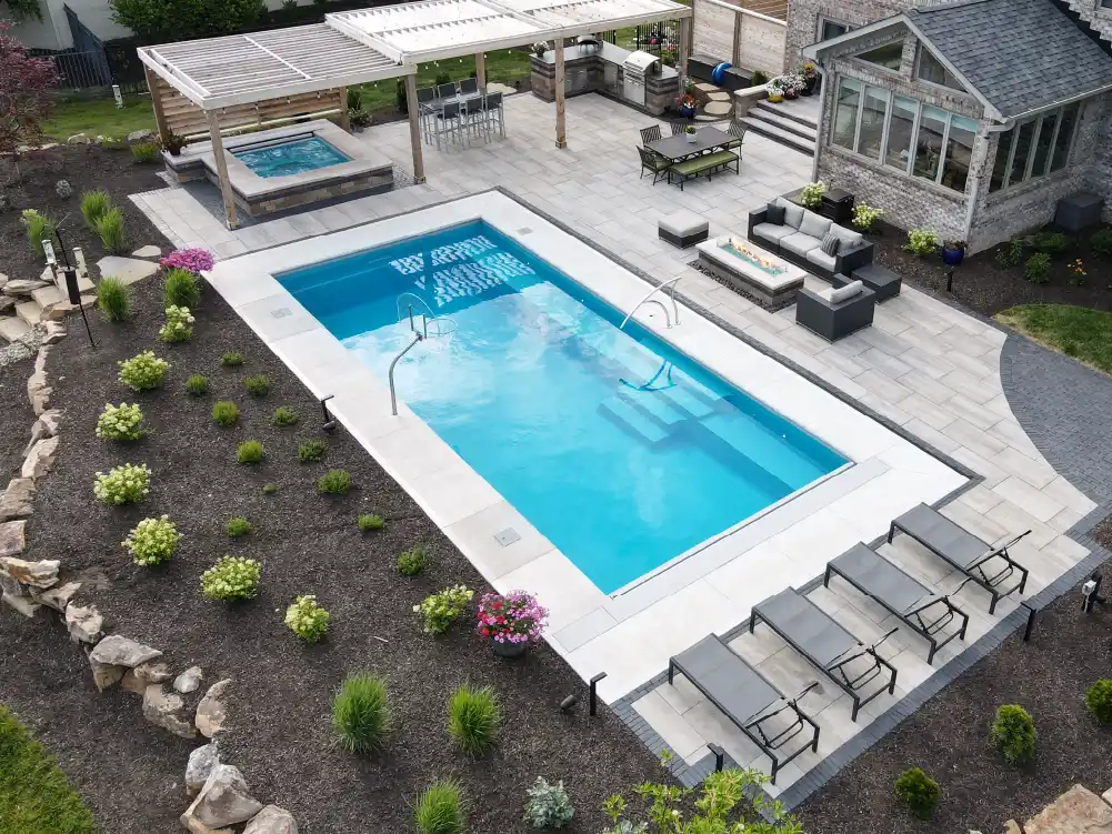 041025-ElevateYourBackyard-4CreatingAmbiance creating pool ambiance: surrounding landscape and hardscape elements