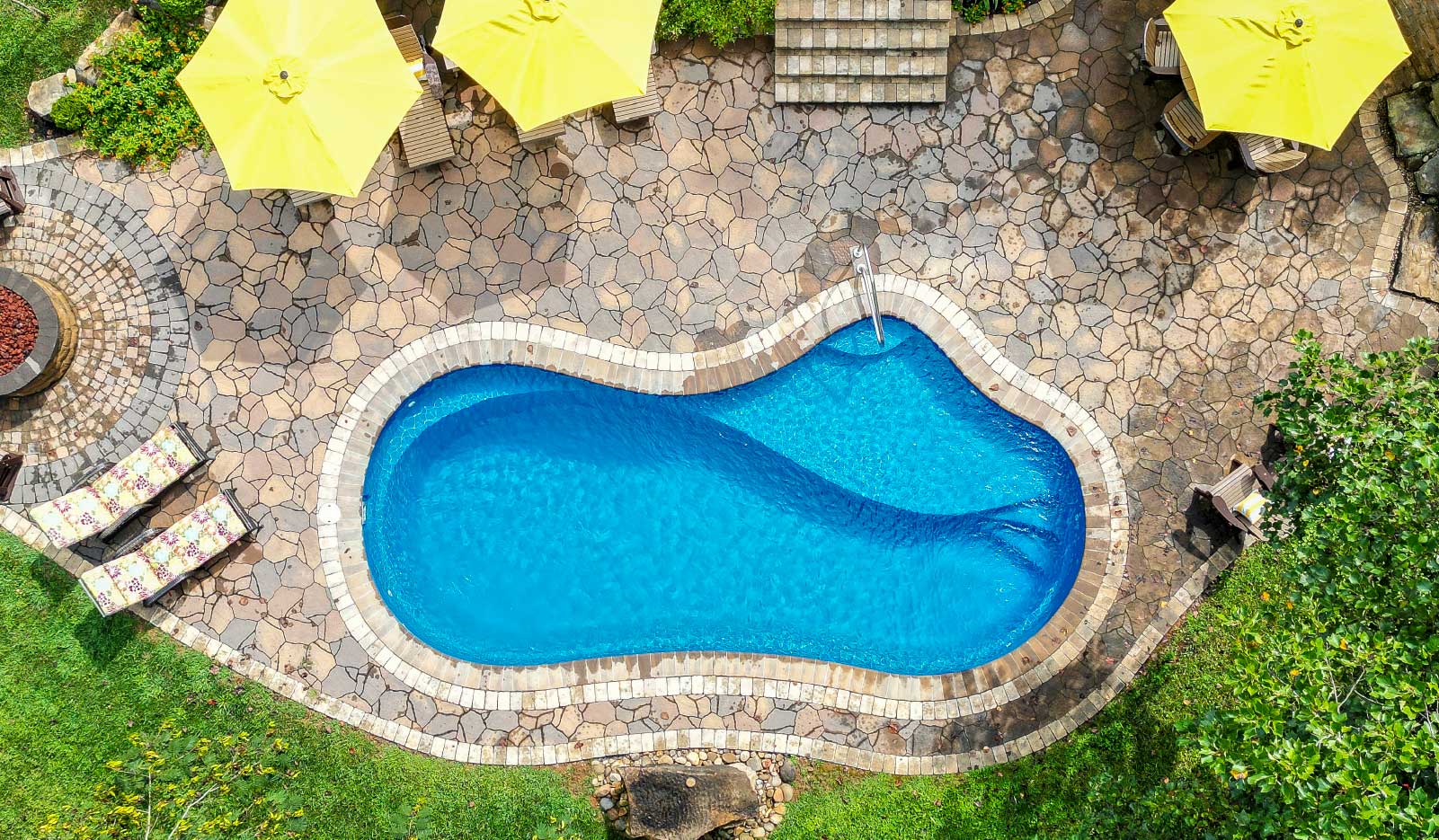 073025-8BestPoolColors-1Hero transform your backyard pool with the 8 best fiberglass pool colors