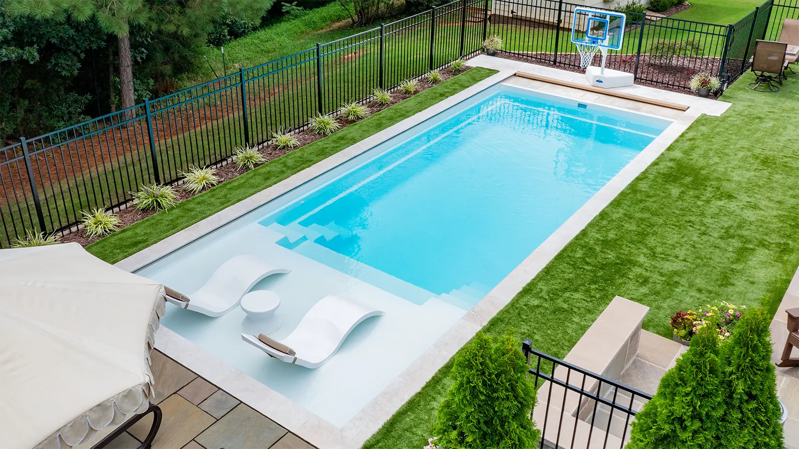 The Imagine Pools Freedom with Splash Pad Fiberglass Pool