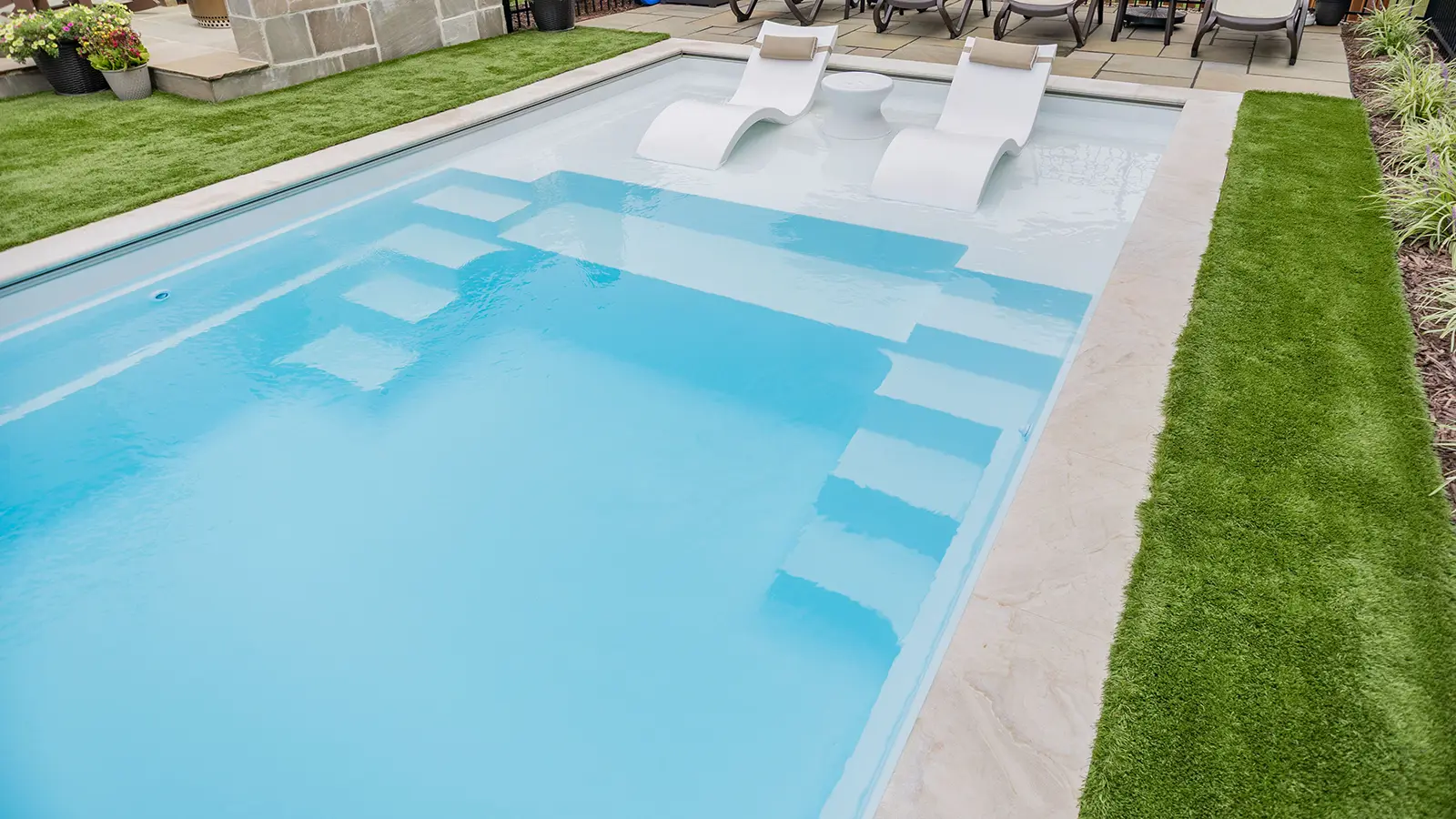 The Imagine Pools Freedom with Splash Pad Fiberglass Pool