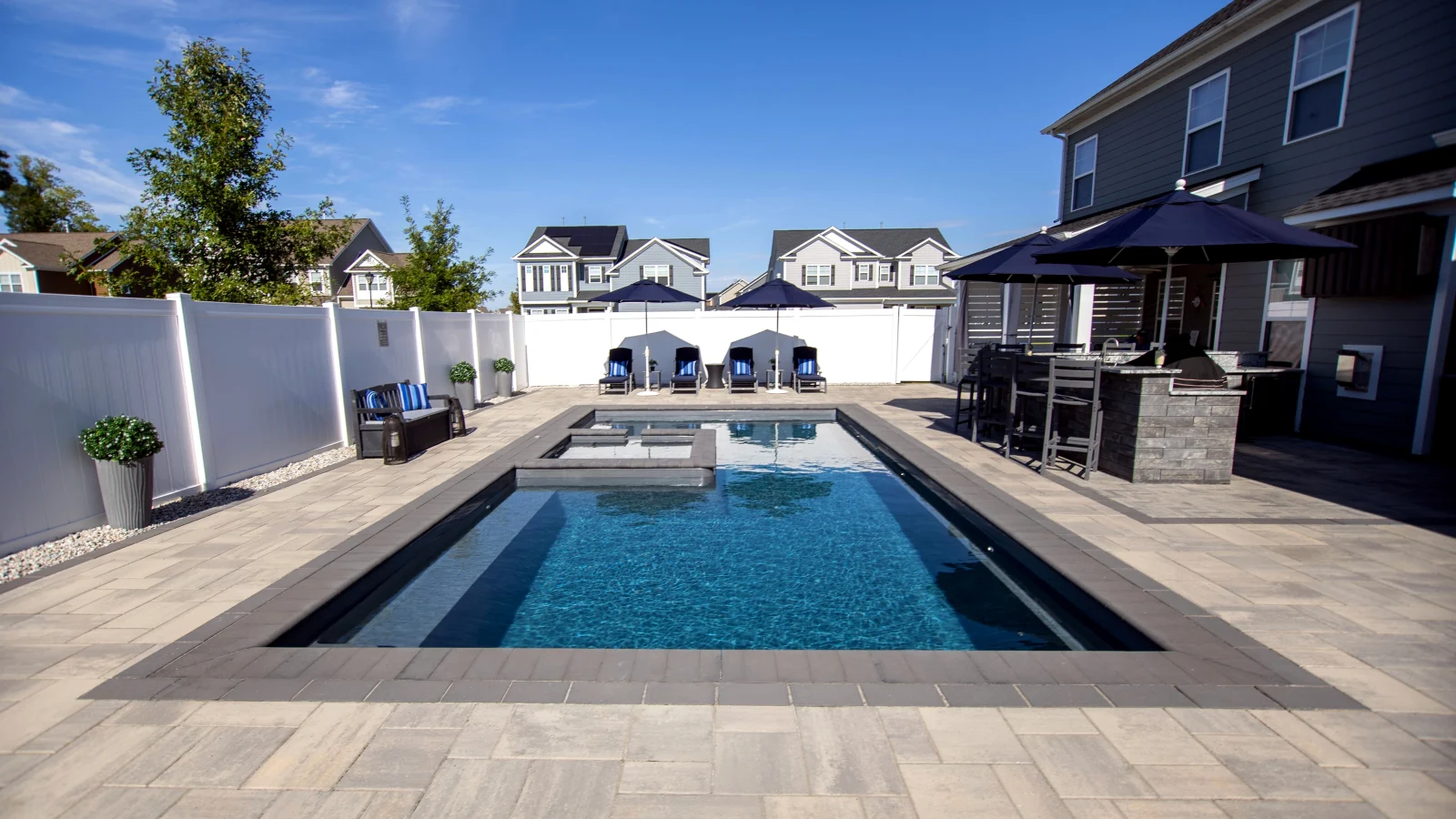 Imagine Pools Exquisite fiberglass pool and spa, straight-on view