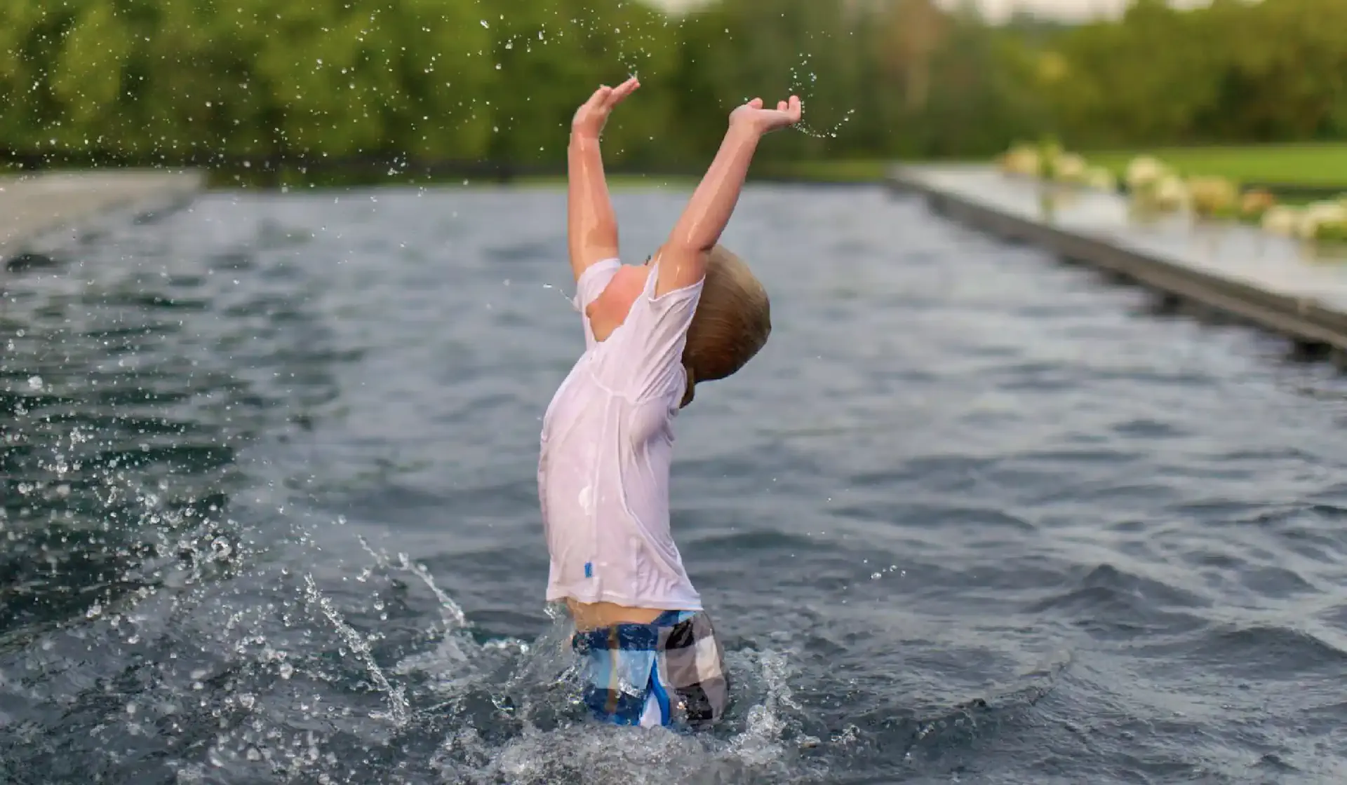 tanning ledge vs. splash pad vs. spa: which pool feature is right for you?